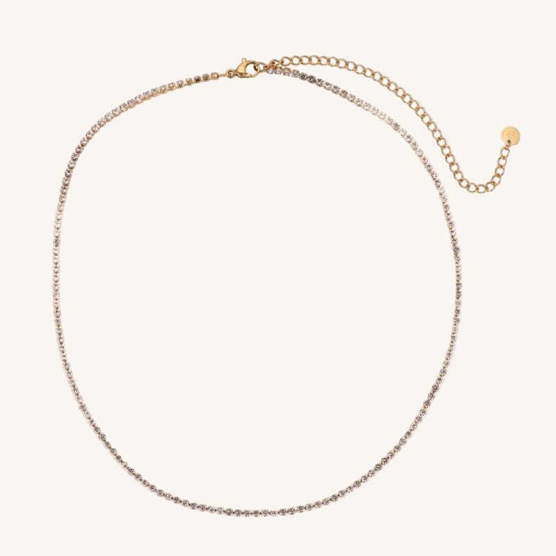 Feine Edelstahl-Tenniskette mit funkelnden Zirkonia und elegantem Glanz von Juwejé.