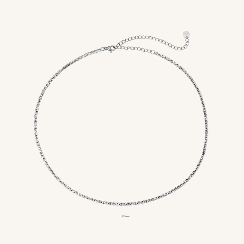 Feine Edelstahl-Tenniskette mit funkelnden Zirkonia und elegantem Glanz von Juwejé.