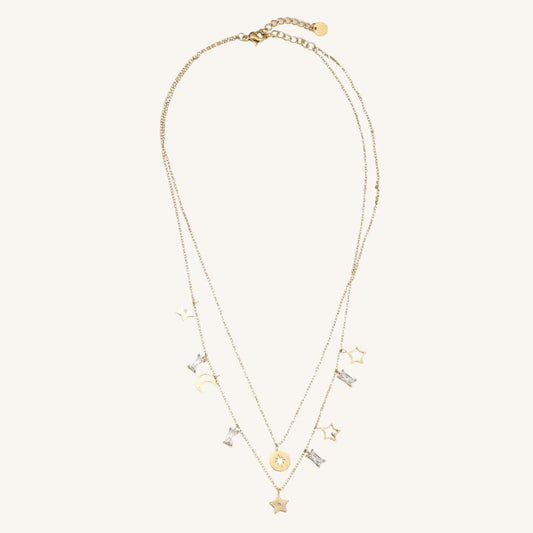 Zweilagige goldene Edelstahlkette mit Stern- und Mondanhängern im himmlischen Design.