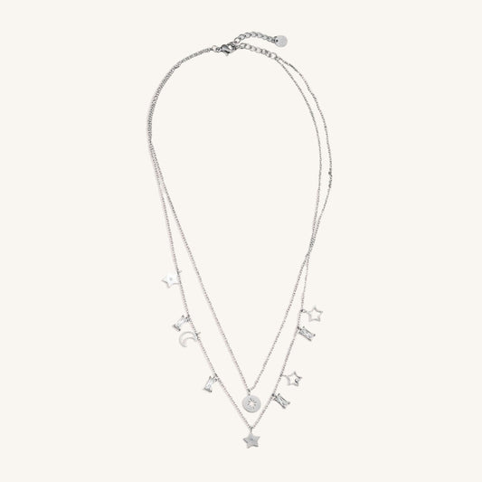 Zweilagige goldene Edelstahlkette mit Stern- und Mondanhängern im himmlischen Design.