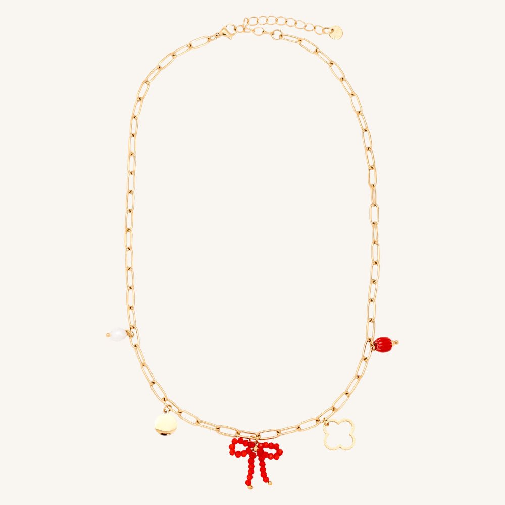 Goldene Edelstahlkette mit feinen Charms und zartem Glanz von Juwejé